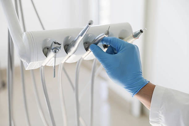 Professional Invisalign Clear Aligners technician working in Somerville, TX